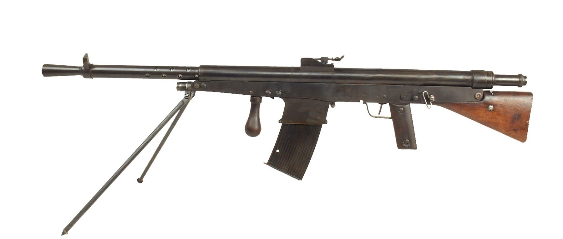Figure 3 — A Model 1918 Chauchat in .30-06, seen from the left: the 16-round box magazine and the wooden front grip moved ahead of it are what distinguish it from the French Model 1915. The gun is a non-firin…