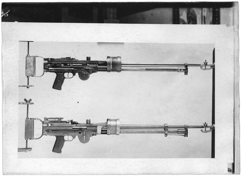 Figure 6 — Aircraft-pattern Lewis guns in a French Army aviation workshop, September 1917, from the series photographed in Lieutenant Rodocanachi's armament workshop in Paris. Neither has a radiator; both hav…