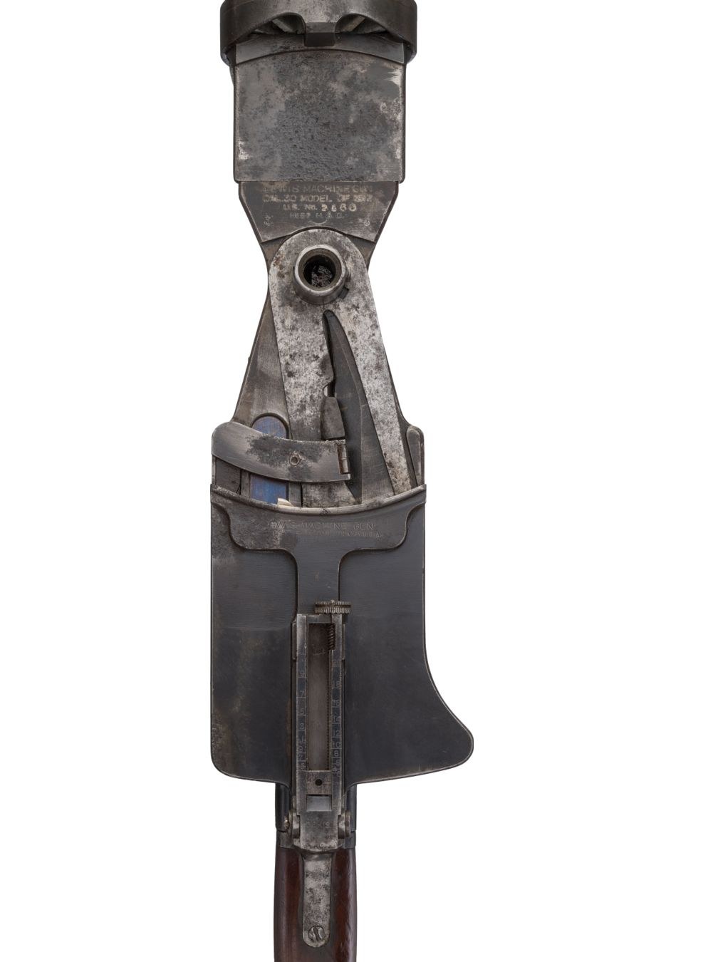 Figure 5 — The top of a Savage-built US Model 1917 with the magazine removed, muzzle at the top. The feed arm lies across the body behind the magazine post; the body cover with its pawl housing is behind it, …