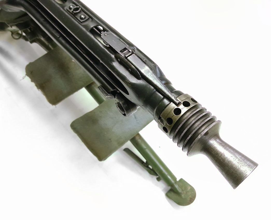 Figure 6 — The muzzle booster of an MG 42 in the collection of Romania's National Heritage Institute, with the ring of vent holes behind the conical flash hider. Photograph: National Heritage Institute (Insti…