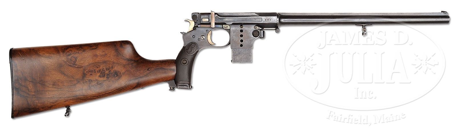 Figure 4 — The 1897 carbine, serial 493, with its solid walnut butt on the standard stock lug, a 13.5-inch barrel and sling swivels under the barrel shroud and on the butt. Julia calls the carbine "amongst th…