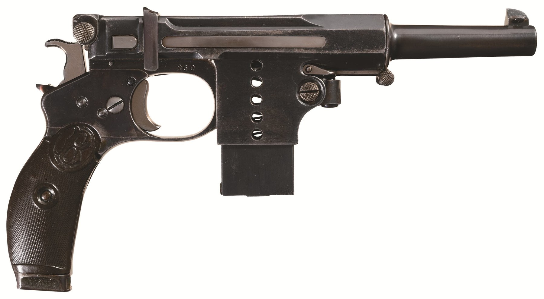Figure 3 — A production Bergmann 1897 No. 5, serial 260, from the right: the barrel inside its shroud, the release lever with its knurled button at the rear of the shroud, the detachable box magazine in front…