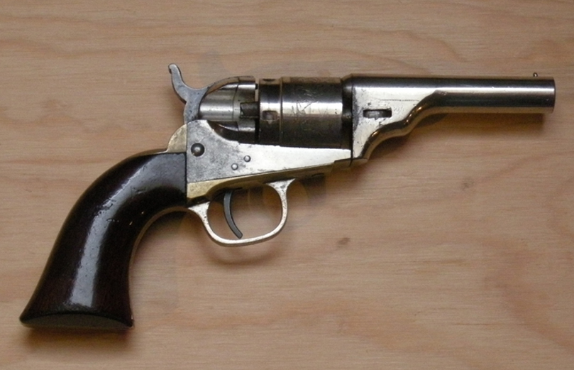 Figure 3 — The Colt New Model .36 Pocket Pistol of 1862, here in a metallic-cartridge conversion — the grip Sefried said he copied with "a few changes". Set the Sentinel's round butt beside it and the debt is…