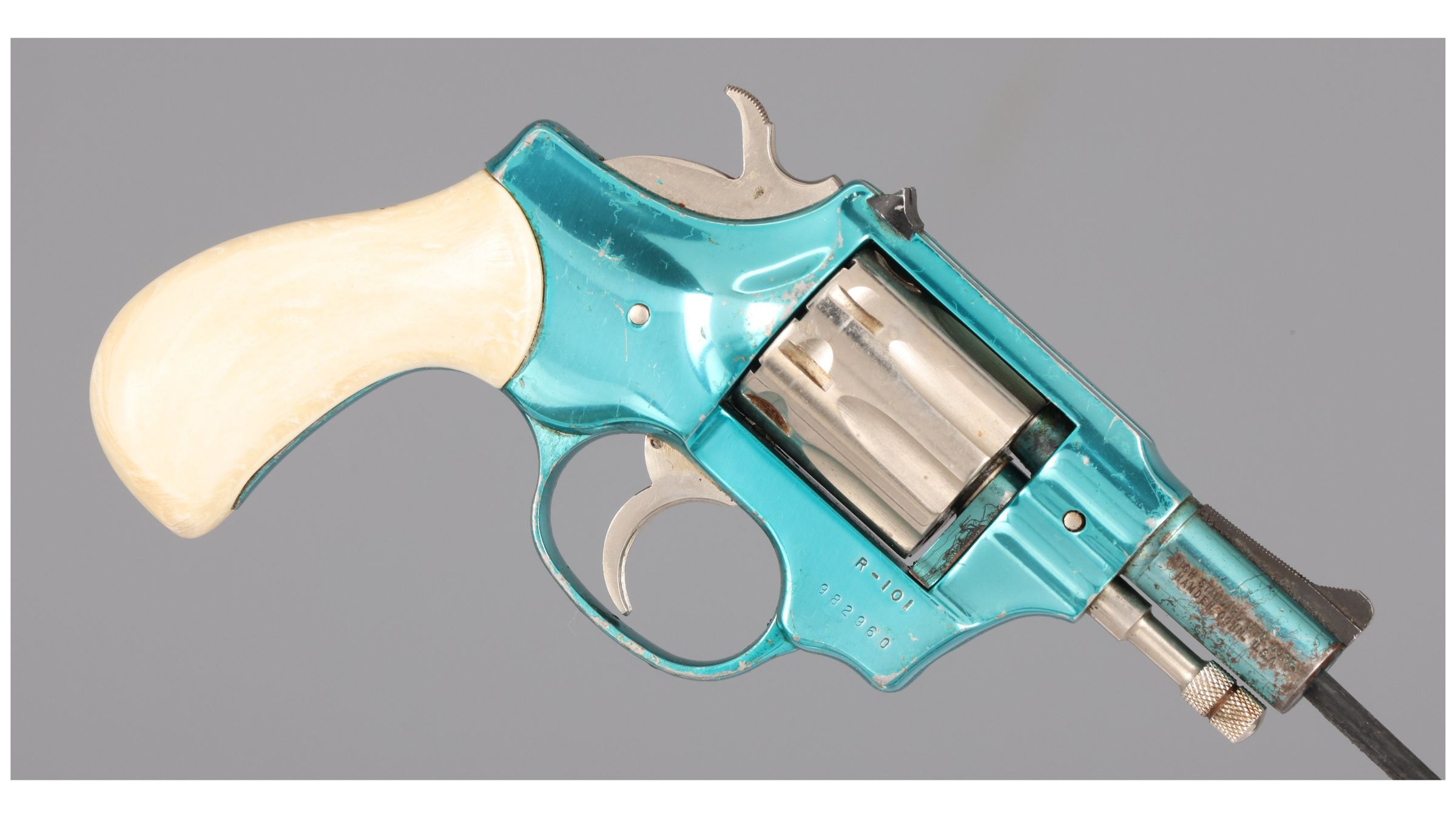 Figure 13 — The turquoise Dura-Tone snub that the auction record catalogued as a plain Model R-101 with its finish given as blue and bright. The frame, trigger guard and barrel are turquoise; the cylinder, ham…
