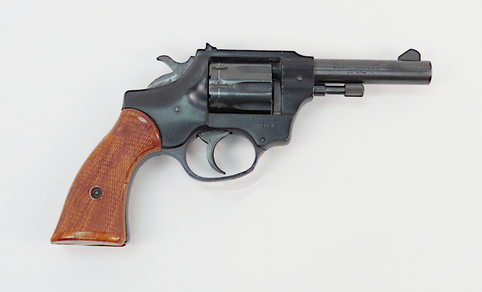 Figure 1 — A Hi-Standard R-106 Sentinel Deluxe in the collection of the Smithsonian's National Museum of American History: the blued frame, the two-piece checkered grips of the Deluxe, the four-inch barrel an…