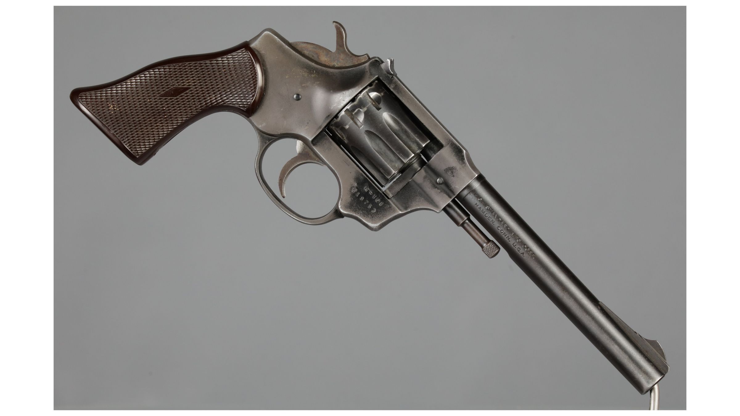 Figure 8 — A blued Sentinel with the six-inch barrel and the one-piece brown plastic grip — the plainest form of the gun, and the commonest. Rock Island Auction photograph, used by owner decision.