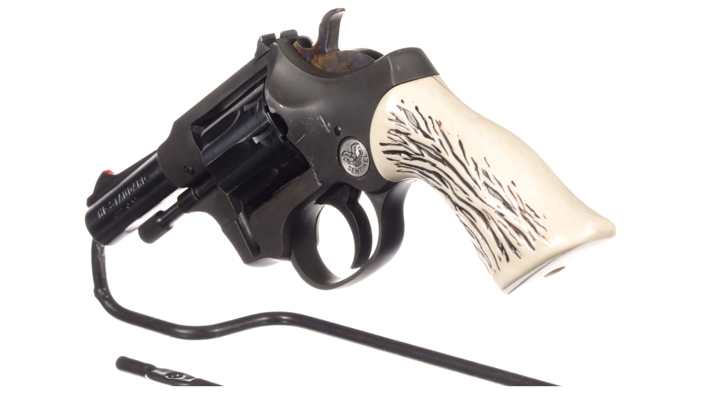 Figure 10 — The factory moulded stag grips, part 7212, on a blued Sentinel — an option priced at five dollars in 1956 and $4.96 in 1961. Rock Island Auction photograph, used by owner decision.