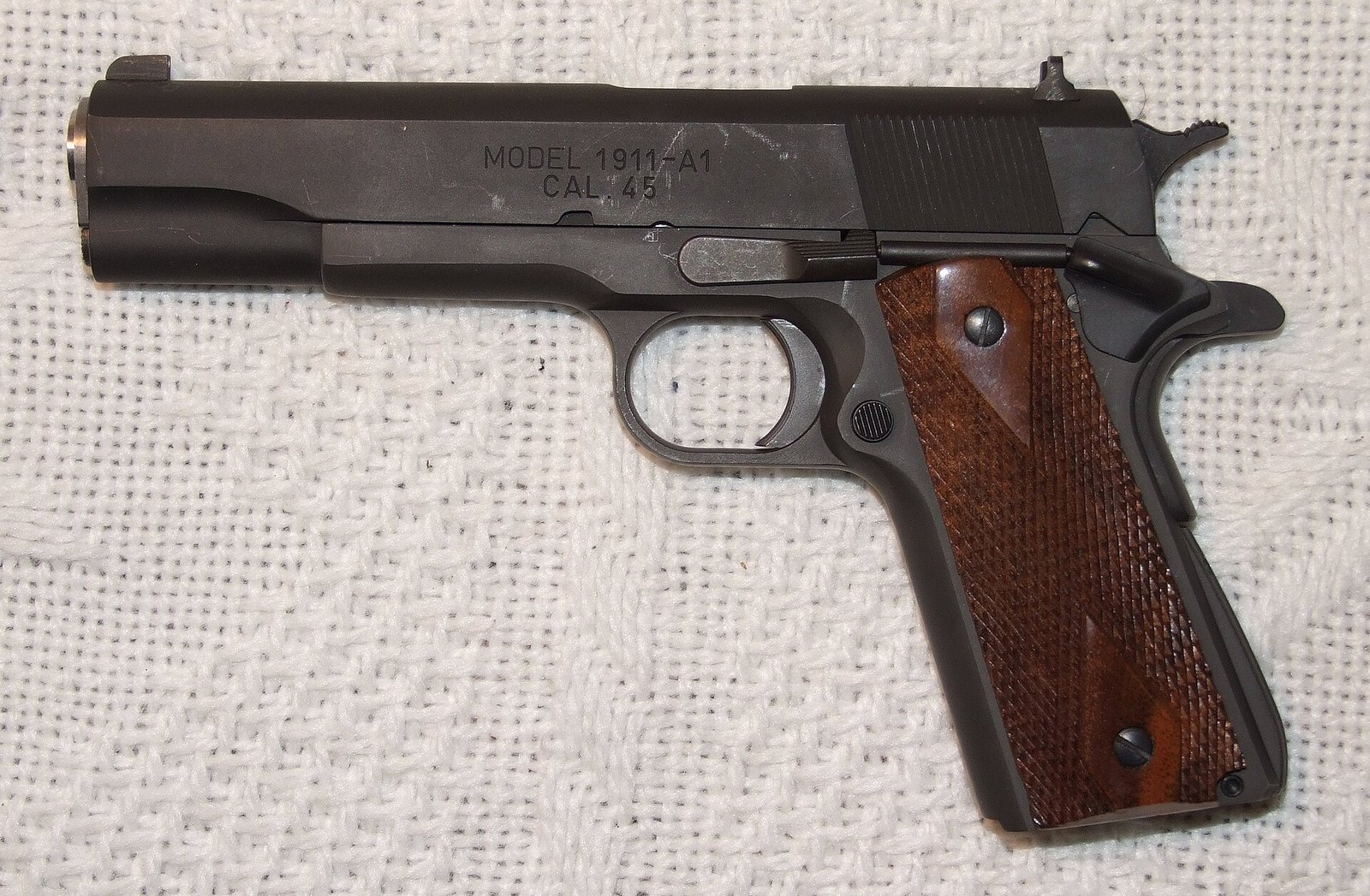 Figure 2 — The M1911A1, the .45 ACP service pistol the M9 replaced in 1985. The OHWS programme kept the cartridge and rejected the pistol (see below).