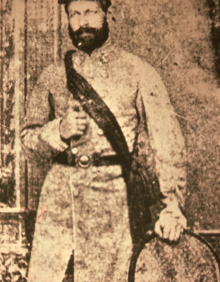Figure 17 — Henry Wirz, the commandant of Andersonville prison, hanged in November 1865. Adams records his LeMat as serial number 189. Photograph published by TradingCardsNPS (Andersonville National Historic S…
