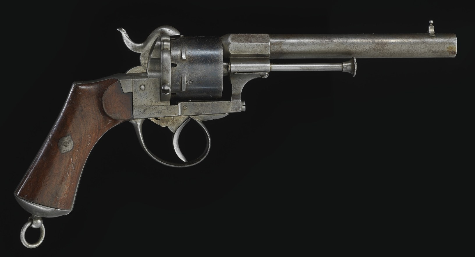 Figure 8 — A Lefaucheux pinfire revolver in the Smithsonian, the type for which the 12 mm cartridge was designed; Rock Island notes that the French military adopted the cartridge about 1857. The LeMat pinfire…