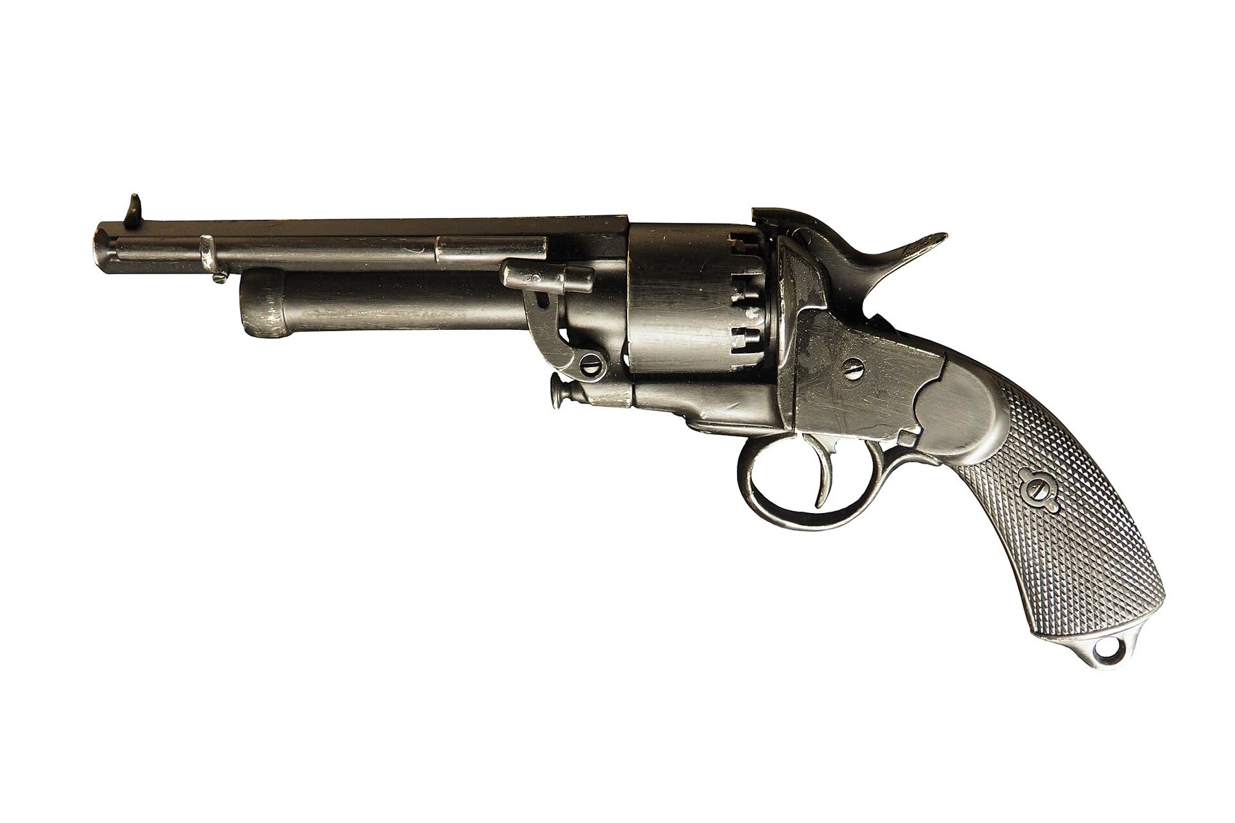 Figure 10 — A non-firing replica of a LeMat by Denix of Spain, photographed from the left side. It reproduces the First Model's spurred trigger guard and ring, and the checkered grip, in cast metal. Replicas o…