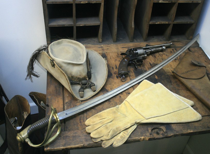 Figure 14 — Stuart's hat, sword and gloves at the Museum of the Confederacy in Richmond, displayed with a revolver; the Commons file is filed under the LeMat revolver, but its description does not identify the…