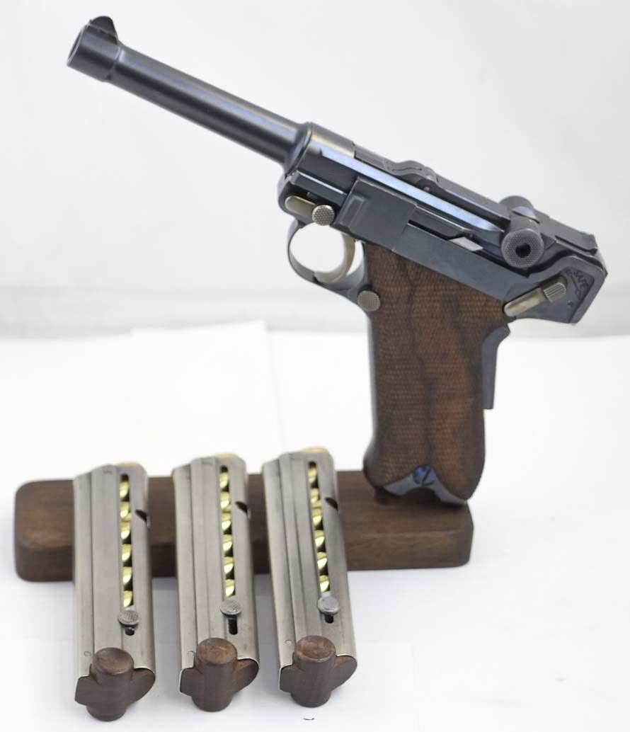 Figure 2 — A .45 ACP Luger made by Lugerman as a functional replica of the 1907 US Army trials pistol, with three magazines. Photograph by Eugene Golubtsov, CC BY-SA 4.0. It is a new pistol, not an original.