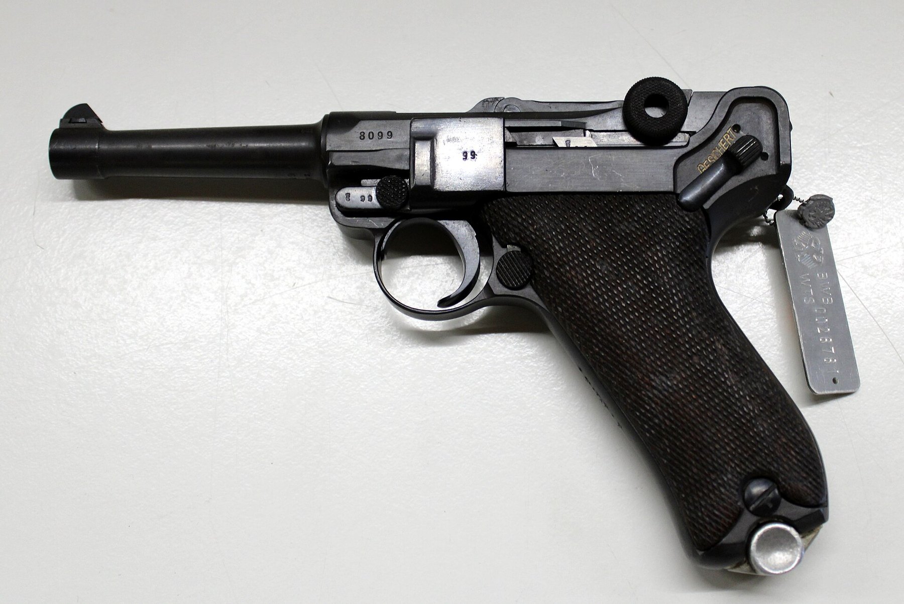 Figure 10 — The Erfurt Pistole 08 of 1911 in the WTS Koblenz study collection, left side. The crowned ERFURT mark on the front toggle link and the 1911 date over the chamber are shown in Volume 5.