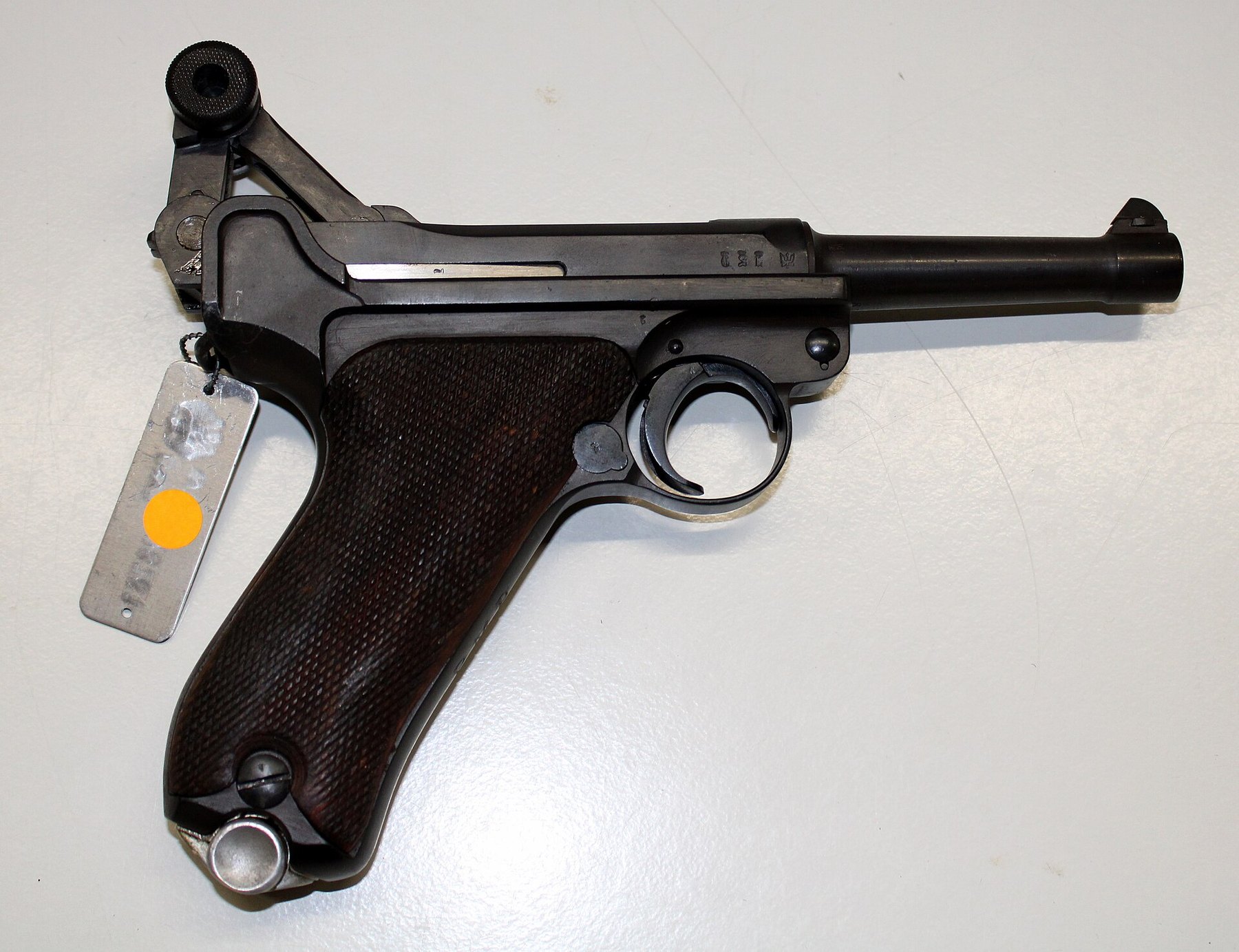 Figure 6 — A P08 with its toggle held open, right side, from the WTS Koblenz collection. The breechblock is withdrawn, the knee broken up, and the magazine well exposed.