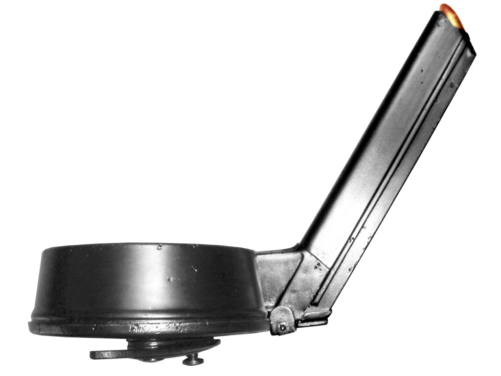 Figure 2 — A Trommelmagazin 08, the 32-round drum: a spiral track in the drum feeds a straight arm that enters the magazine well. Photograph by Edmond Huet, released to the public domain.