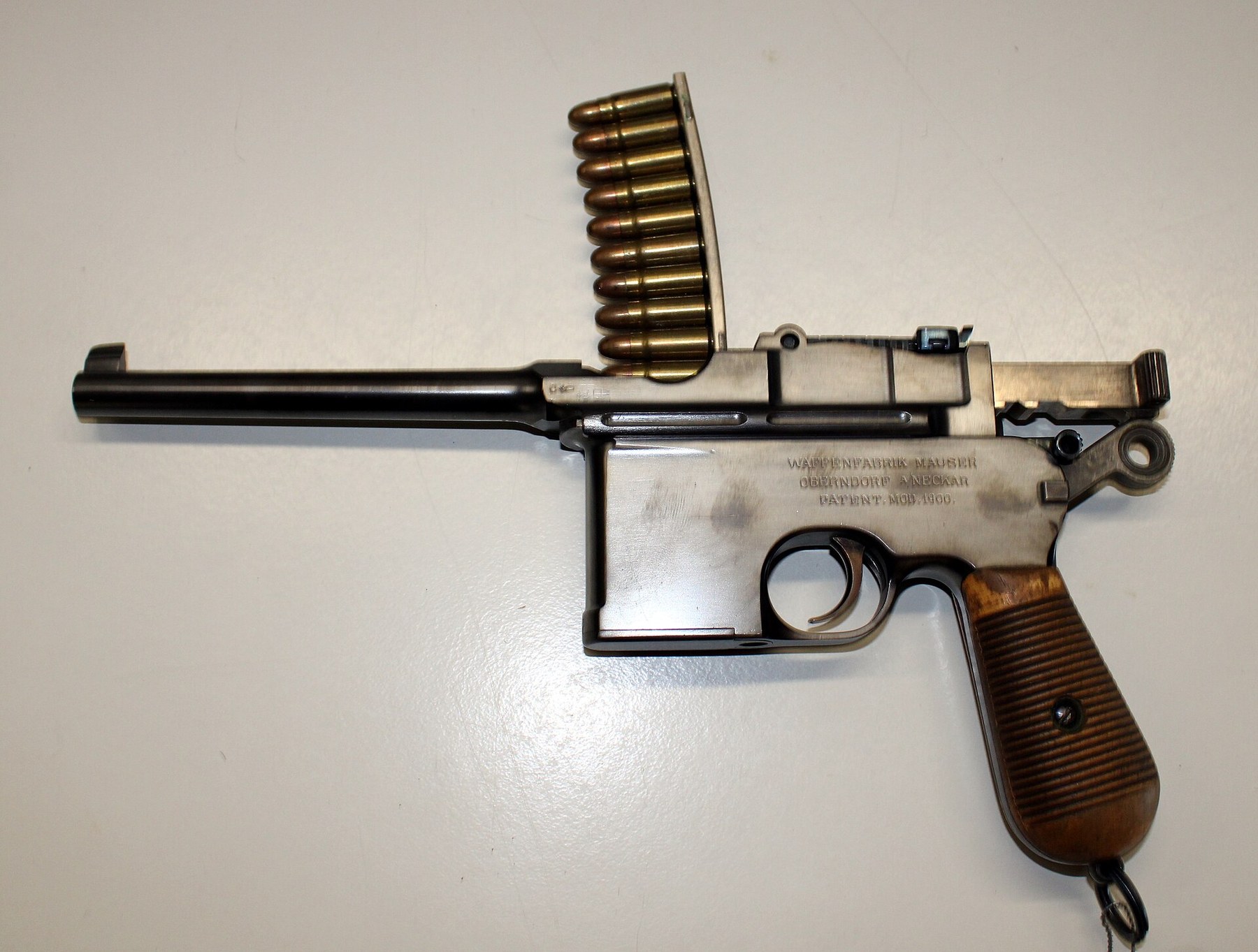 Figure 10 — An early Mauser C96 in the Wehrtechnische Studiensammlung Koblenz with a loaded clip in its guide: exposed hammer, no cocking lever. Compare the Mannlicher above. Photograph: Archiv WTS-Koblenz, CC…
