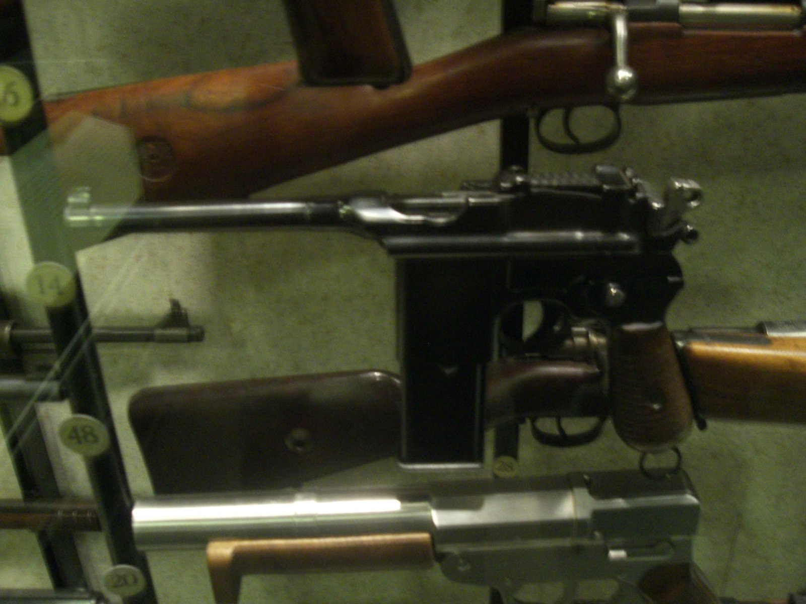 Figure 3 — 3 — A Mauser Schnellfeuer (select-fire C96) with its detachable stock — externally close to a semi-auto M30 apart from the fire-selector on the left rear of the frame. Shown for identifica…