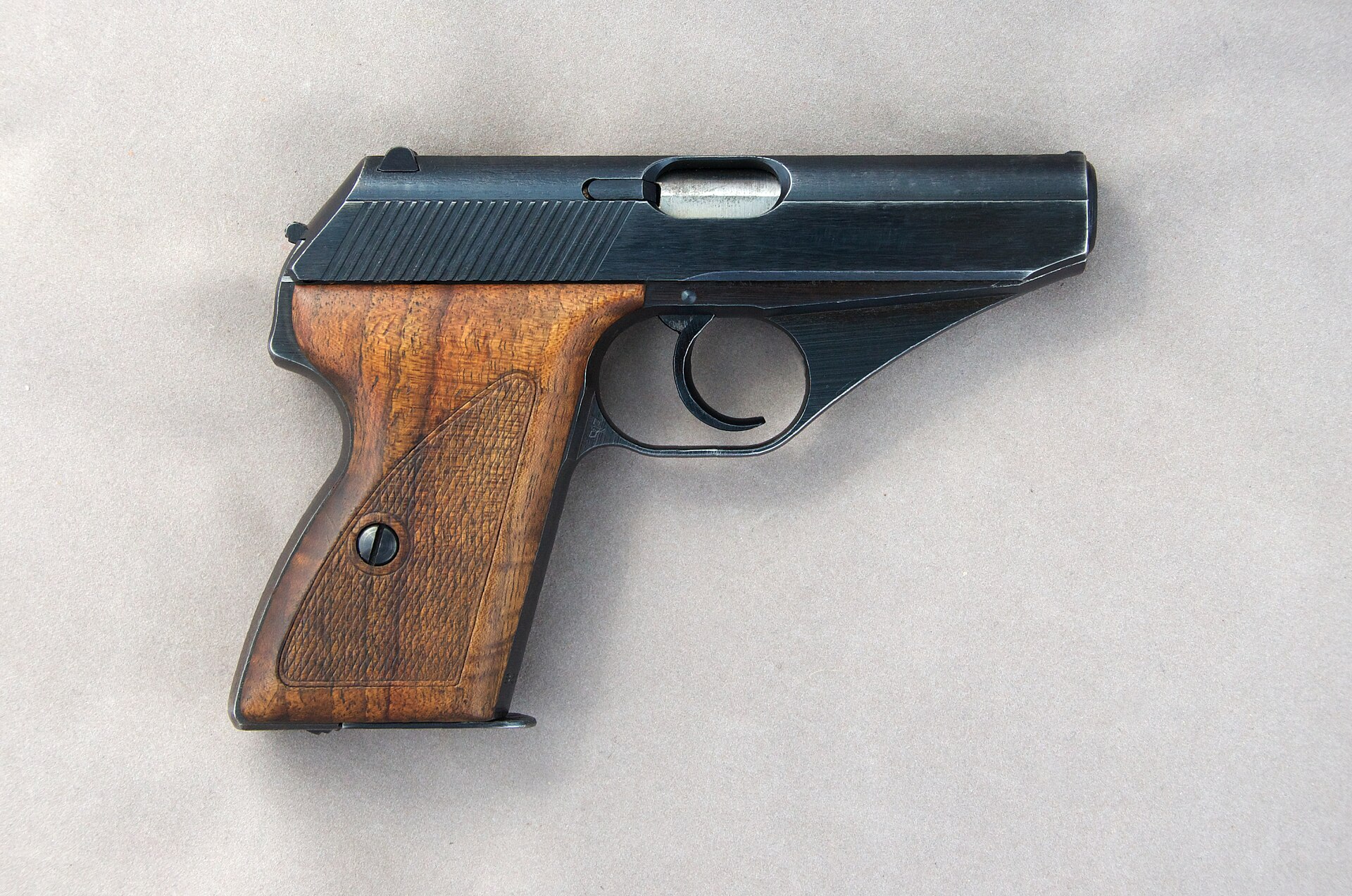 Figure 3 — The same pistol from the right. The Eagle over N firing proofs described by the collector literature belong on this side, at the rear web of the trigger guard and at the front of the slide. Photogr…