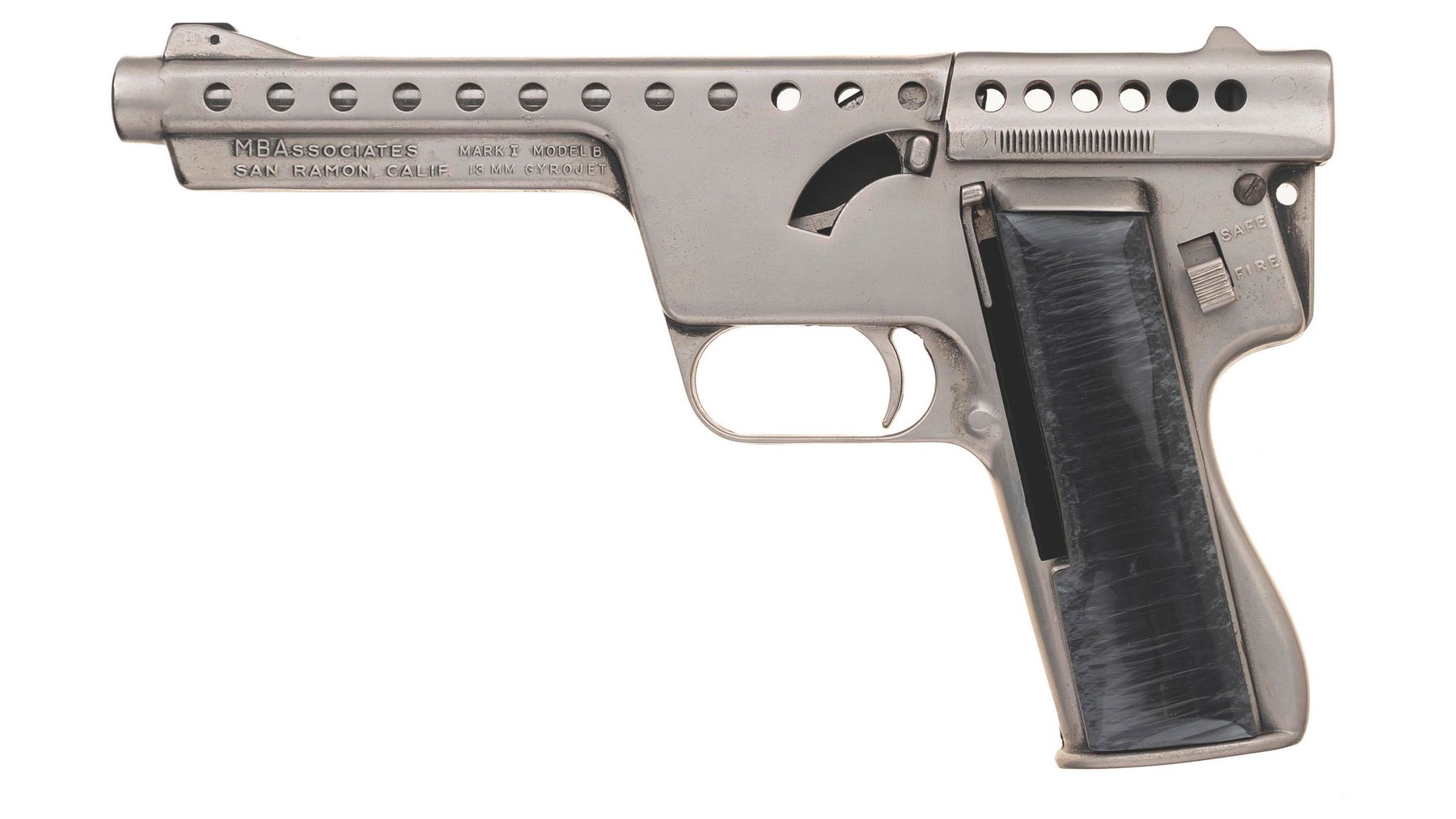 Figure 7 — A Mark I Model B in a nickel finish with black synthetic grips, left side: the vented tube, the rolled address and model marking on the lug, the rear slide over the chamber, and the follower slot b…