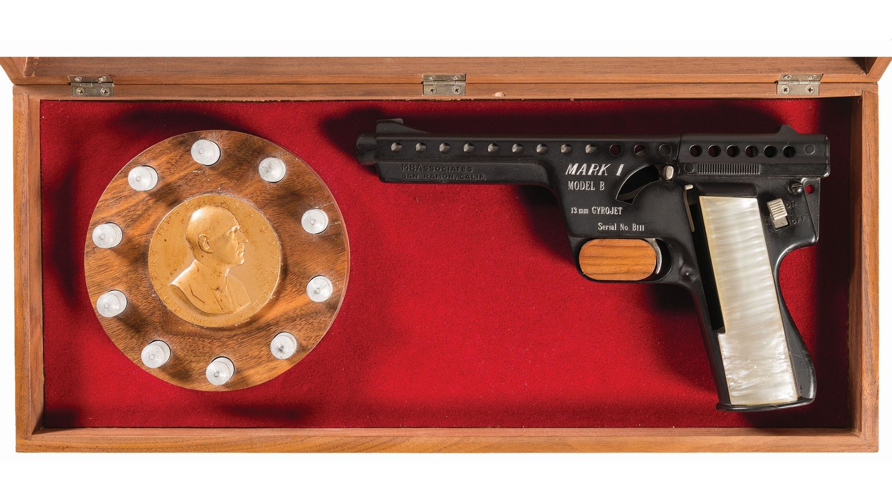 Figure 13 — A cased Model B in black with white pearlite grips and silver-filled markings, sold at Rock Island in 2020 as the property of Brigadier General Erik H. Nelson, one of the 1924 round-the-world flyer…