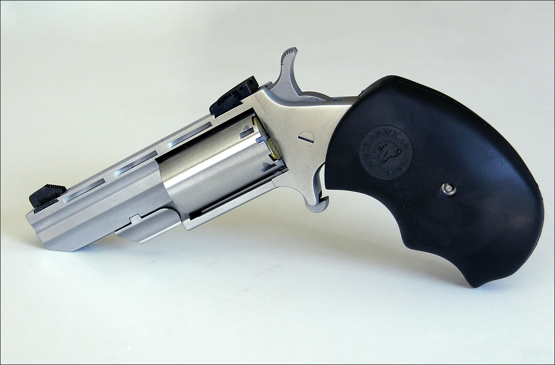 Figure 4 — A Black Widow in .22 Magnum, model NAA-BW-M. The frame and cylinder are the Magnum mini's. What changes is a 2-inch heavy barrel with Marble Arms sights and an oversized rubber grip that fills the …