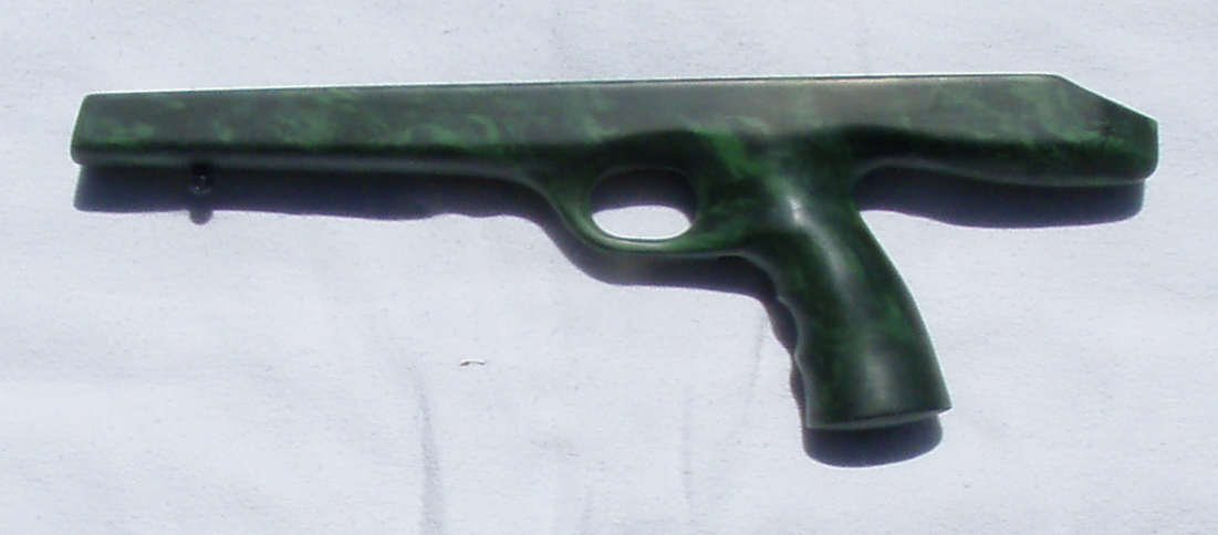 Figure 4 — A bare aftermarket McMillan fibreglass stock for the XP-100, rear-grip pattern. Photo: File:McMillan xp100 left.jpg, via Wikimedia Commons.
