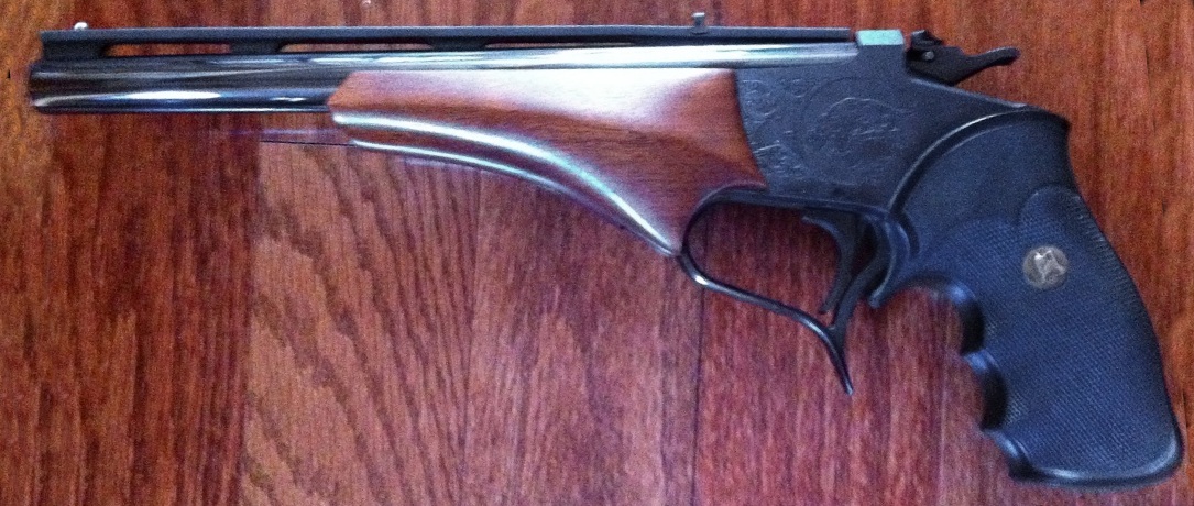 Figure 8 — A Thompson/Center Contender. Interchangeable barrels, not accuracy, are what made it the XP-100's problem. Photo: File:Thompson Center Contender.jpg by Mike Searson at English Wikipedia. License: C…