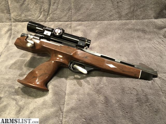 Figure 5 — An XP-100 in .221 Fireball with a period scope. This configuration — centre grip, nylon stock, Fireball — is what most of this market consists of, and it is what Vol 5 concludes a buyer should want…