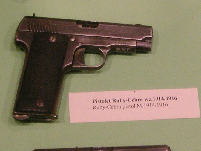 Figure 2 — A Ruby-type in the Museum of the Polish Army, Warsaw, labelled "Pistolet Ruby-Cebra wz.1914/1916". The Cebra was an Arizmendi, Zulaica pistol, some sold under a Beistegui Hermanos legend (Vol 5). P…