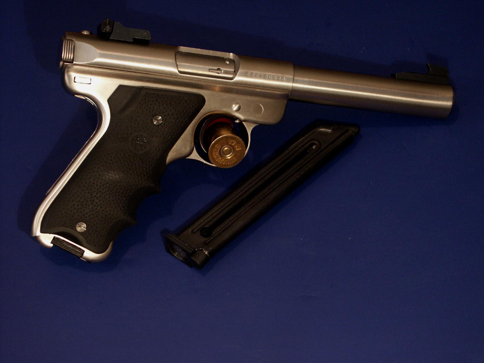 Figure 5 — A stainless Mark II with a 5½-inch bull barrel — Ruger's catalog designation KMK512, the stainless Mark II counterpart of the blued Mark III Target documented in these volumes. The magazine catch i…