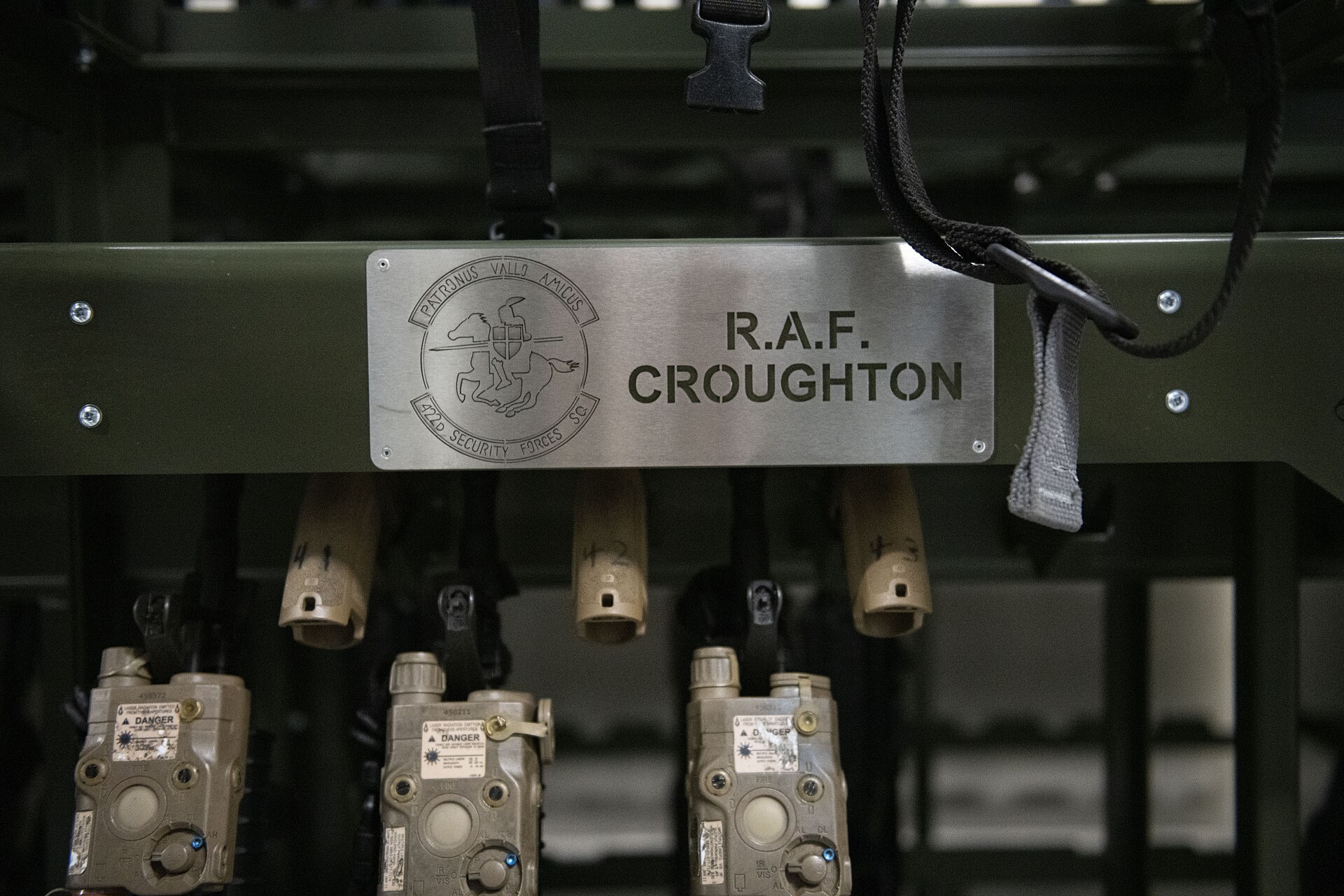 Figure 2 — M18 pistols racked in a U.S. Air Force armory. Air Force Global Strike Command inspected 7,970 M18s in 2025 and reported discrepancies, mostly wear, in 191.