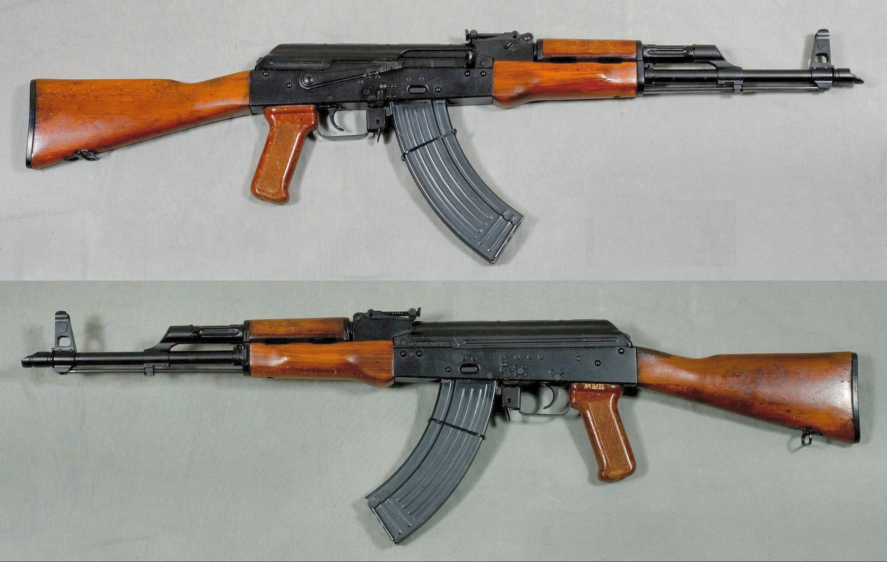 Figure 1 — An AKM from the collection of the Swedish Army Museum, photographed from both sides. The slanted cut at the muzzle, the ribbed sheet-metal receiver, the laminated furniture and the straighter butts…