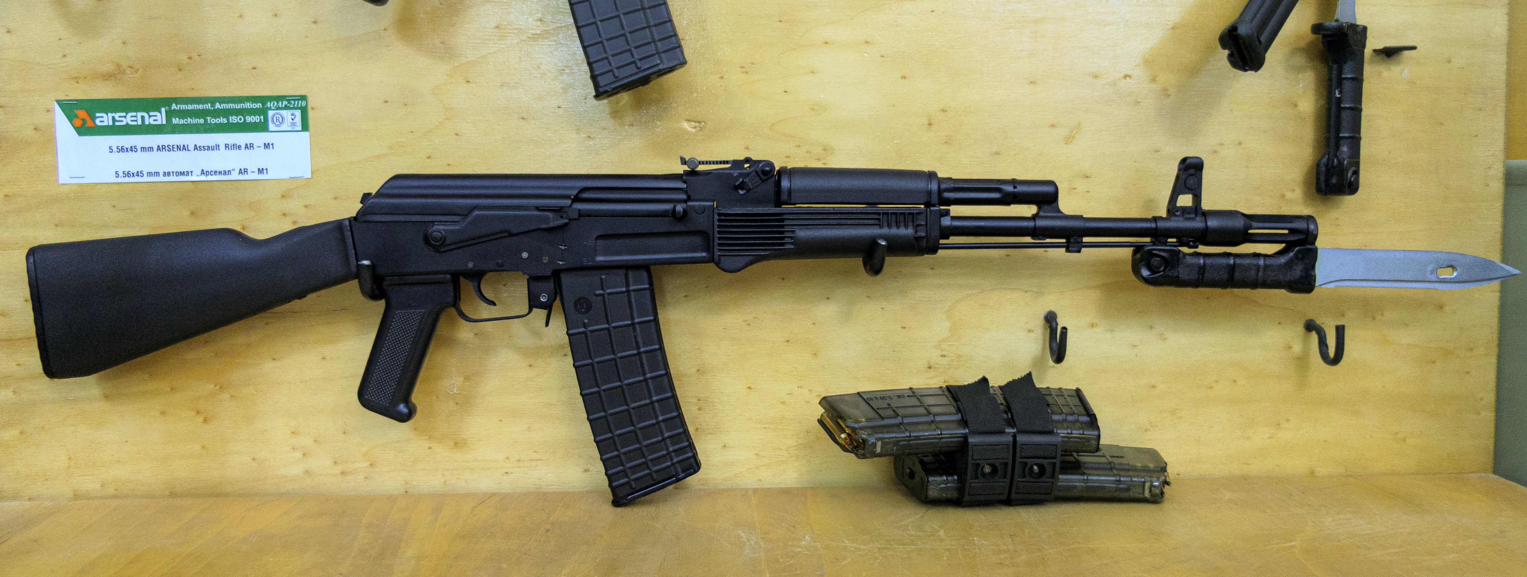 Figure 3 — A modern Arsenal rifle of the AR-M1 family displayed with its magazines and bayonet. Arsenal's current production is the commercial continuation of Factory 10.