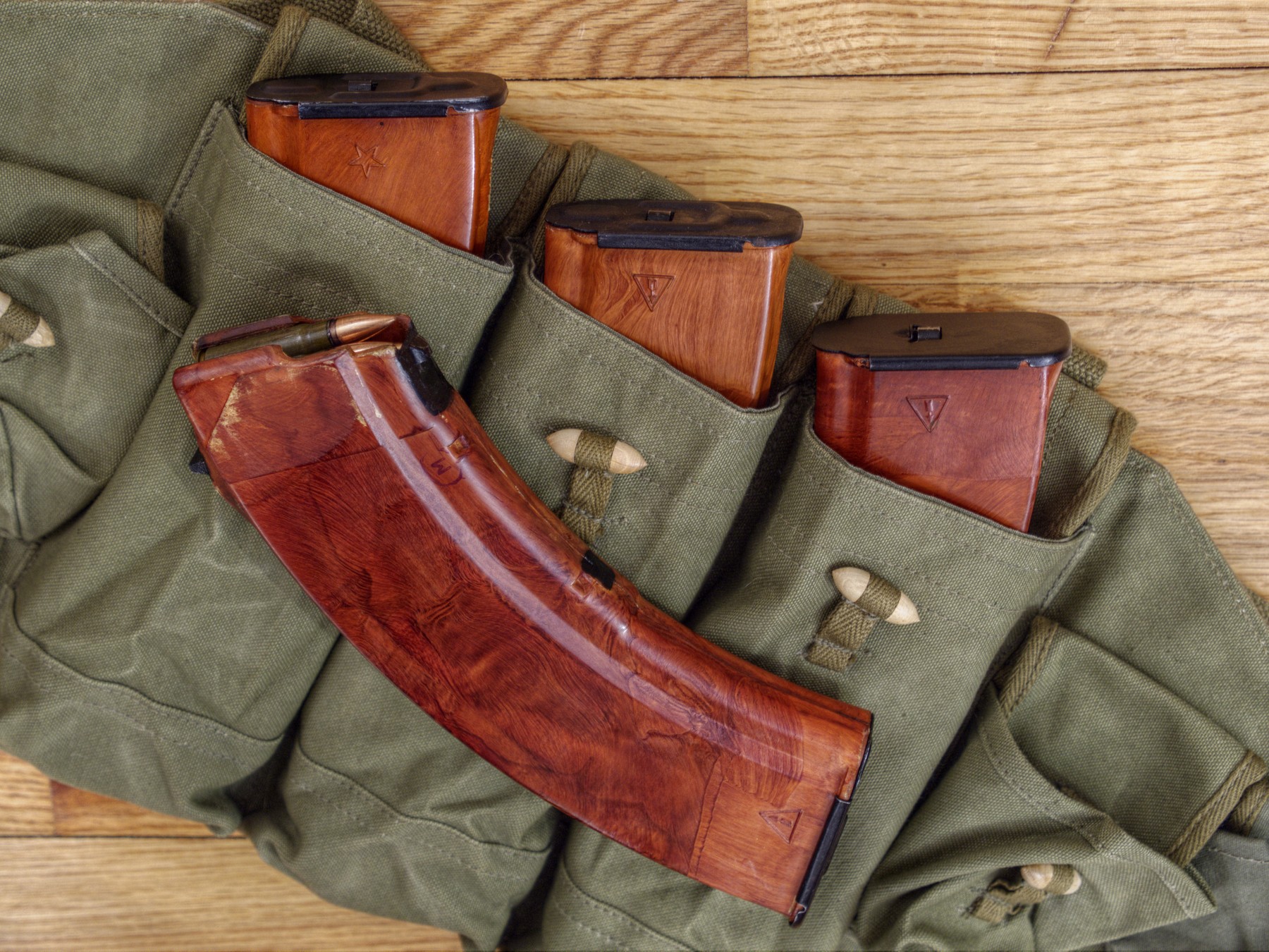 Figure 5 — Soviet ribbed "bakelite" magazines. They are steel-reinforced glass-filled plastic rather than actual bakelite, and along with the earlier steel magazines they are one of the least glamorous and mo…