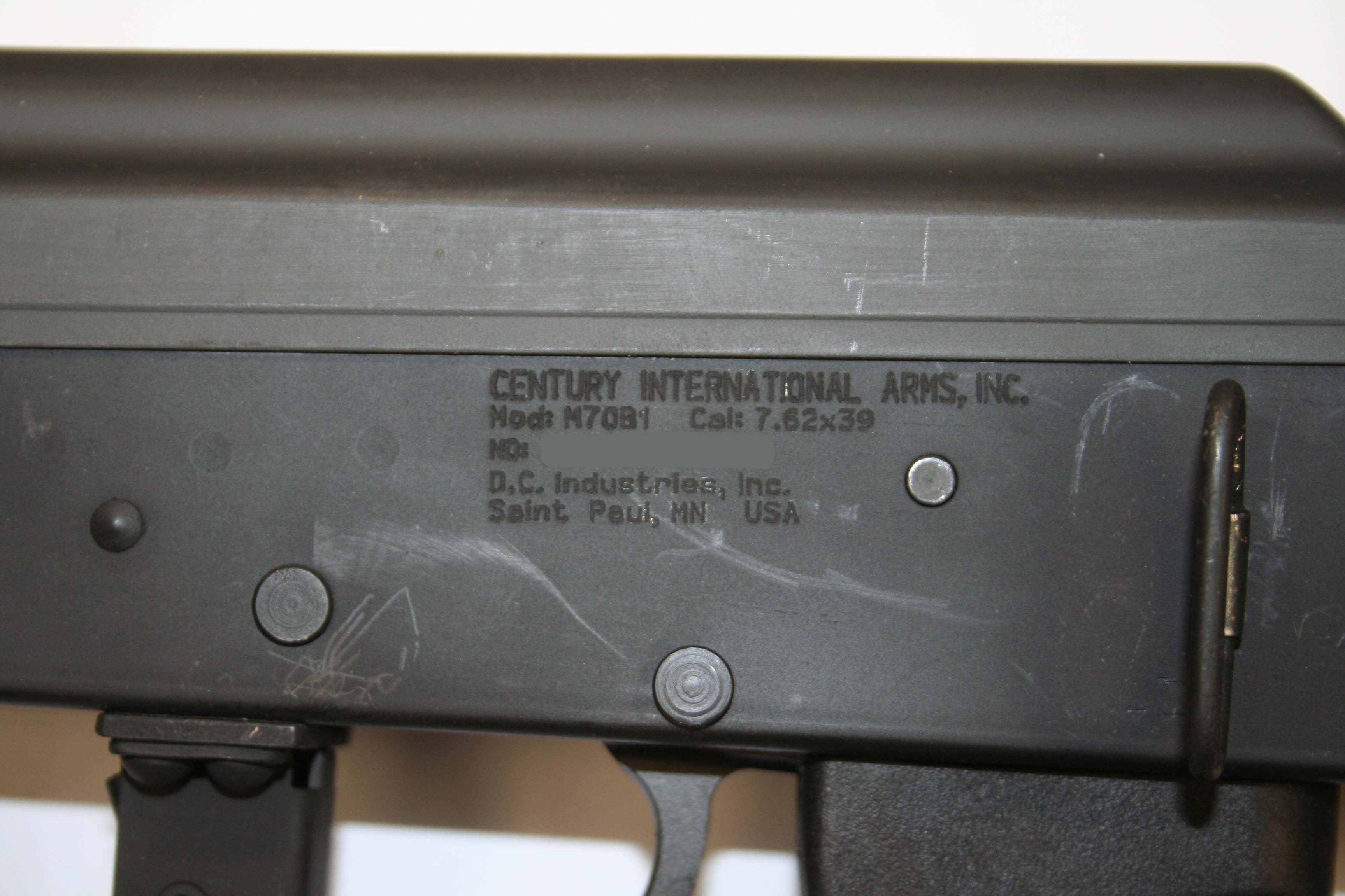 Figure 4 — An American importer's markings rolled onto the receiver of a Yugoslav-pattern rifle: Century International Arms, a model designation, the calibre, and a Saint Paul, Minnesota address. Marks like t…