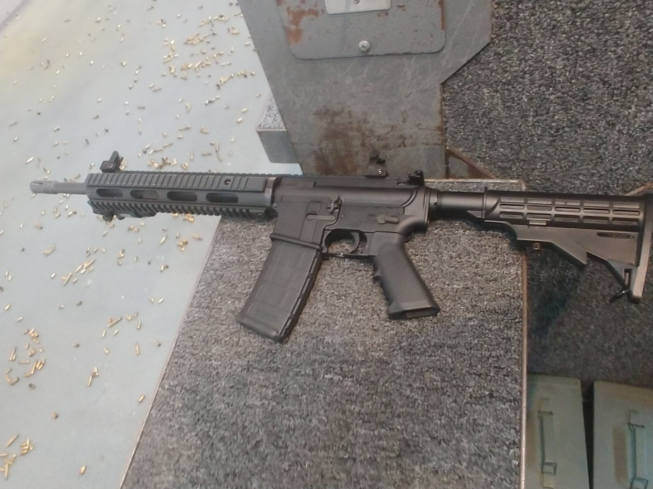 Figure 8 — A carbine on a range bench. Most of the decisions in this volume are reversible, which is the argument for making them one at a time and shooting between changes.
