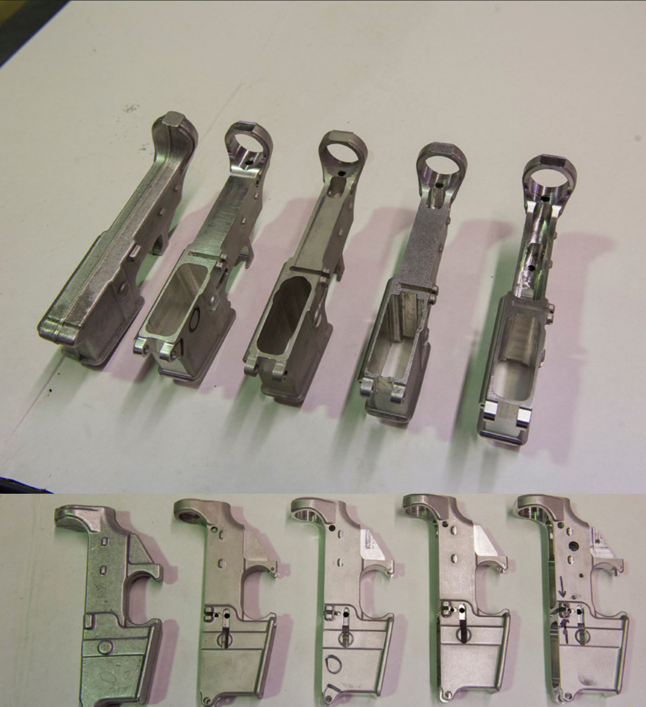 Figure 4 — Lower receivers at several stages of completion. The step from an unfinished casting or forging to a receiver that will accept a fire control group is a machining operation, and it is the step that…