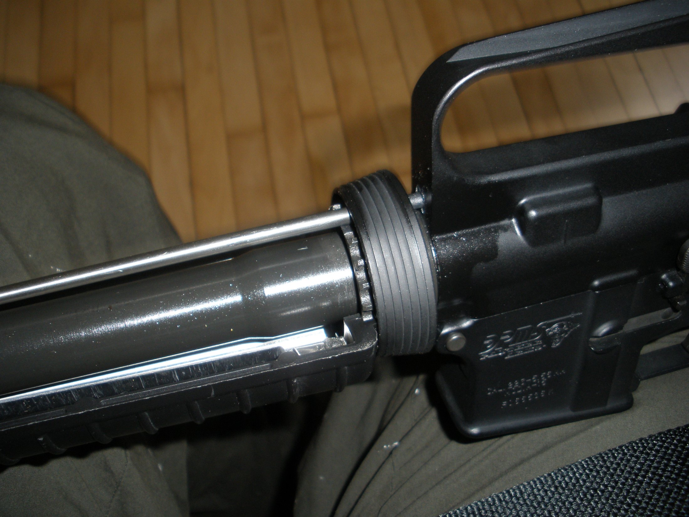 Figure 2 — The barrel nut and handguard interface on an M16-pattern rifle. The barrel nut is the single joint that locates the barrel in the upper, and it is also the part a free-float handguard replaces or c…