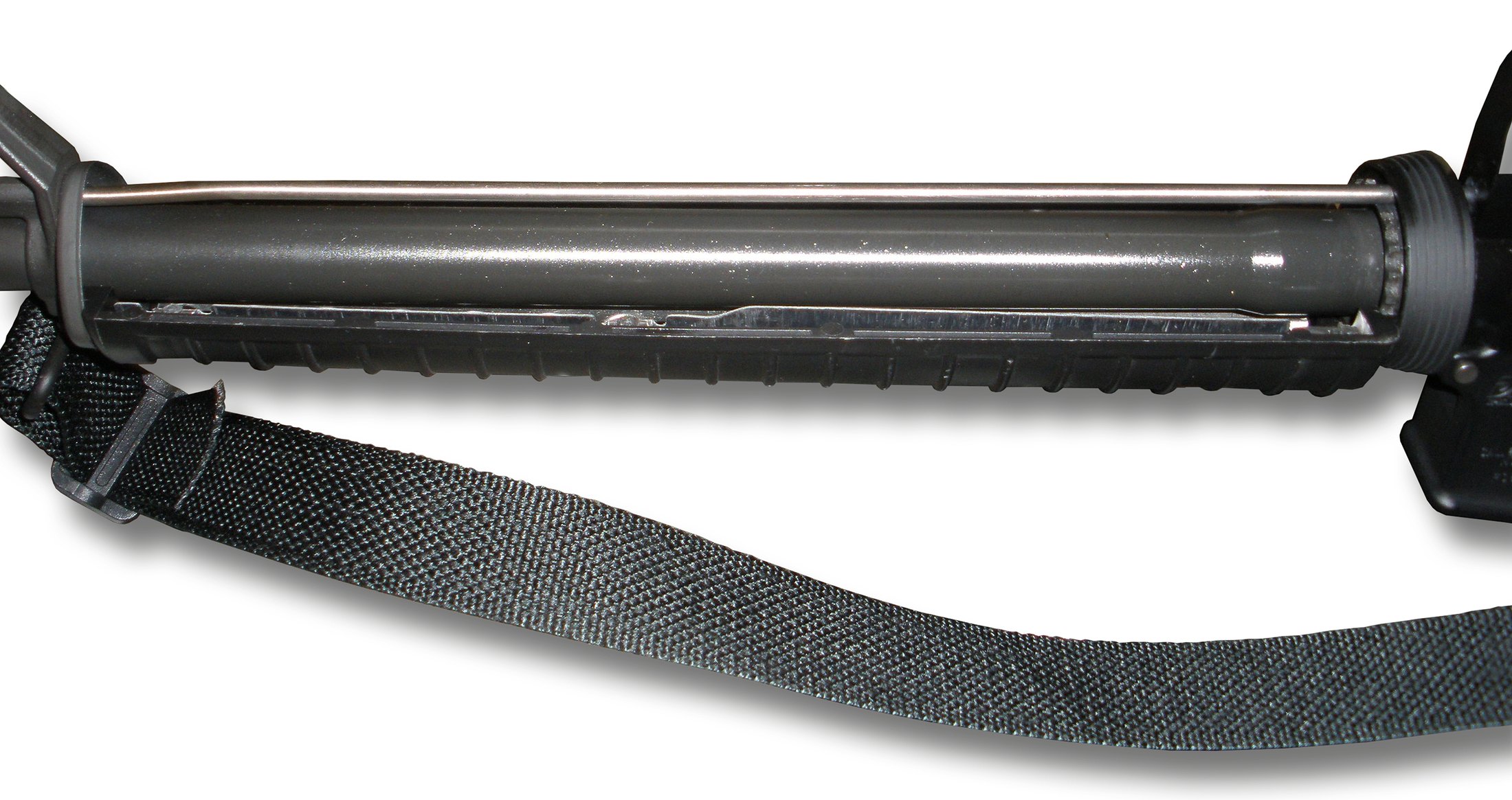 Figure 4 — The gas tube running above the barrel, from the gas block back to the upper receiver. It carries no piston and no rod; the moving parts it drives are inside the receiver.