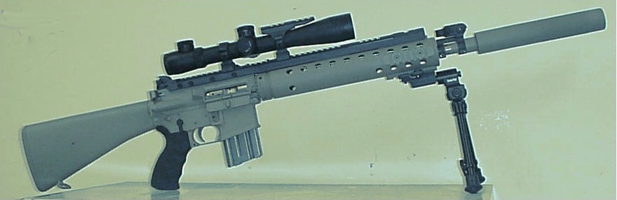 Figure 7 — An early Special Purpose Rifle. The long free-floated tube, the magnified optic, the bipod and the suppressor collar are the configuration in one frame.