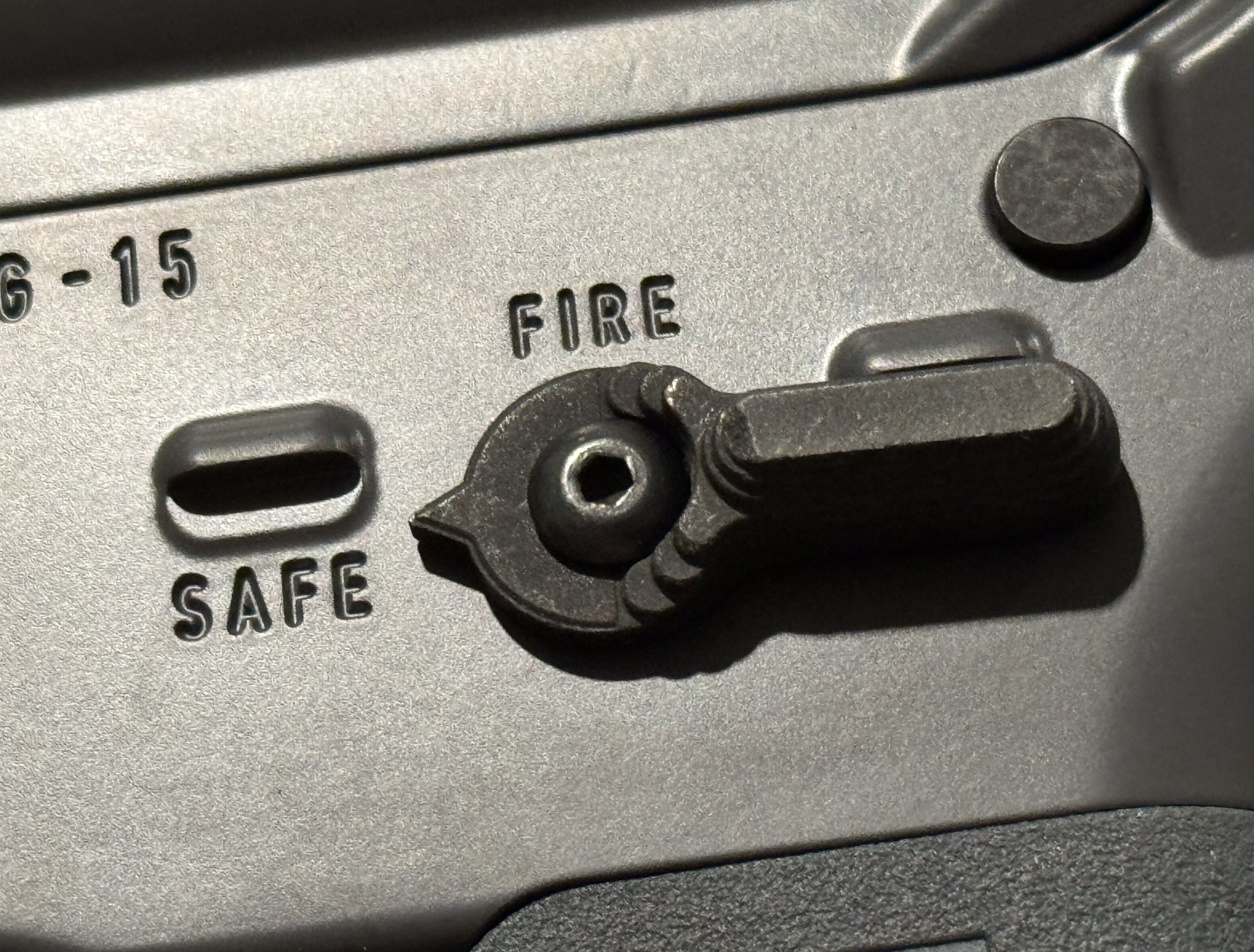 Figure 6 — The selector on a semi-automatic AR-15: two positions, SAFE and FIRE. A service rifle's selector has a third.