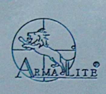 Figure 4 — The ArmaLite lion roundel, as used after the company left Fairchild in 1961. This example was photographed on a later ArmaLite AR-10; Knupp says the AR-7's receiver casting kept the earlier winged-…
