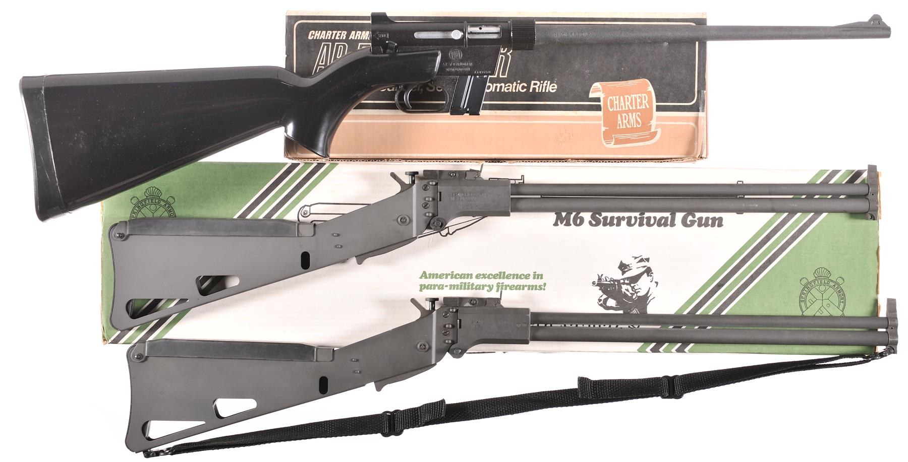 Figure 2 — A Charter Arms AR-7 offered in one lot with two Springfield M6 survival guns, civilian versions of the Air Force's Ithaca M6 (Volume 1), with their boxes. The civilian survival-gun market kept both…