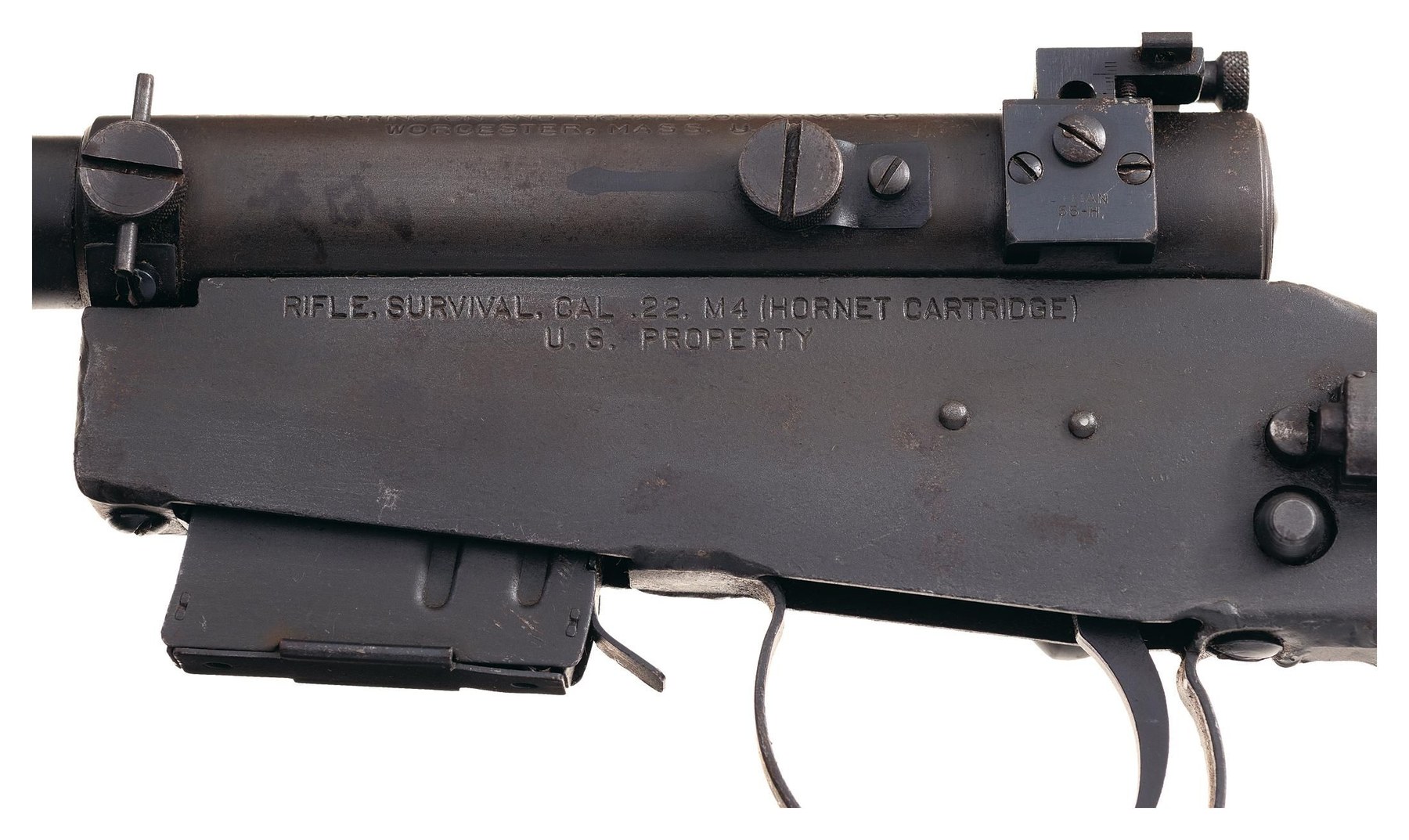 Figure 2 — The receiver of a U.S. property-marked H&R M4 survival rifle: "RIFLE, SURVIVAL, CAL .22 M4 (HORNET CARTRIDGE) / U.S. PROPERTY". Rock Island Auction Company, lot 80/426 (September 2020). All rights …