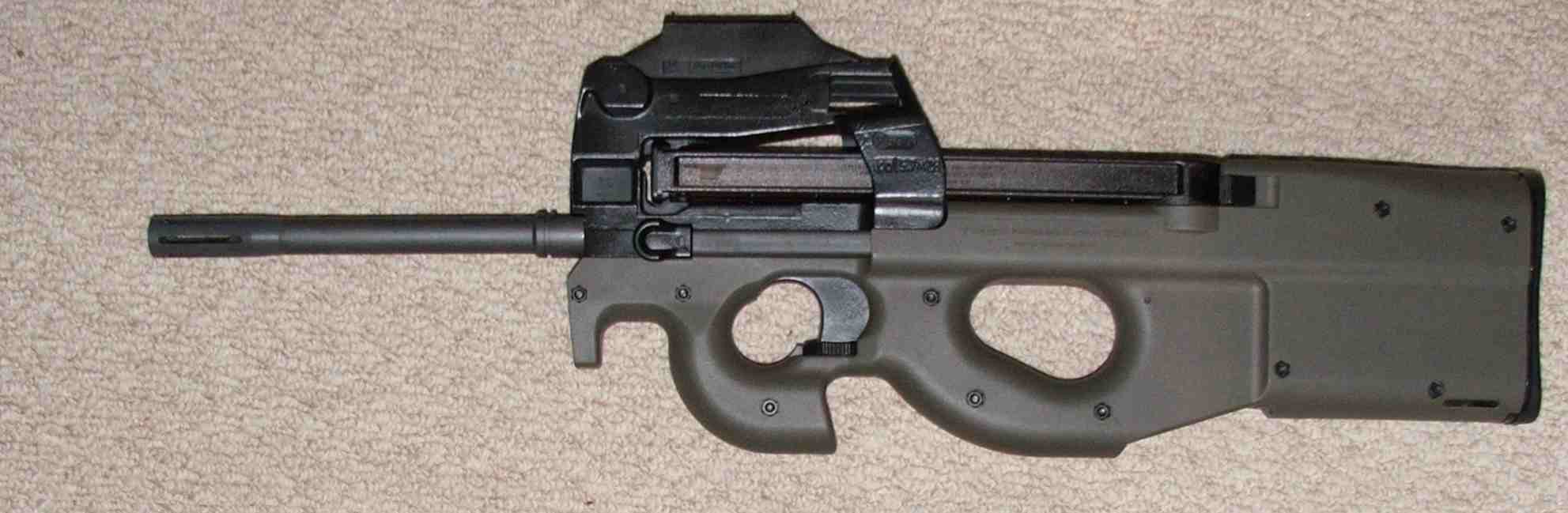 Figure 6 — The PS90. Compare the muzzle to the photographs above: the barrel runs far forward of the polymer shell, which is the immediate visual tell that separates a civilian PS90 from a military P90 at a g…