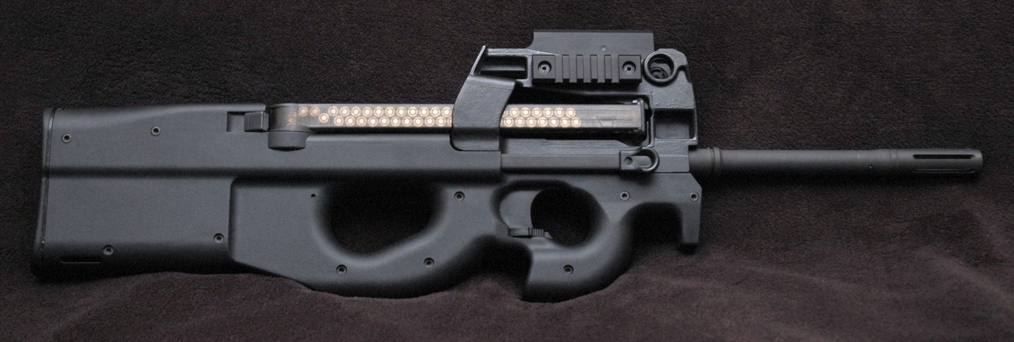 Figure 4 — A PS90 USG, with the moulded reflex sight housing rather than a rail, and the long civilian barrel. The USG configuration is recorded as discontinued in 2011.