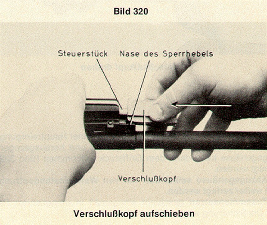 Figure 8 — Reassembly: the bolt head is slid onto the control piece so that its bevelled face sits in front of the nose of the locking lever, both labelled in the regulation's own photograph.