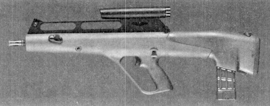 Figure 6 — Steyr-Mannlicher's Advanced Combat Rifle, as photographed for the US Army in 1989: a bullpup with a long top rib and a magazine behind the pistol grip, firing plastic-cased flechettes from a rising…