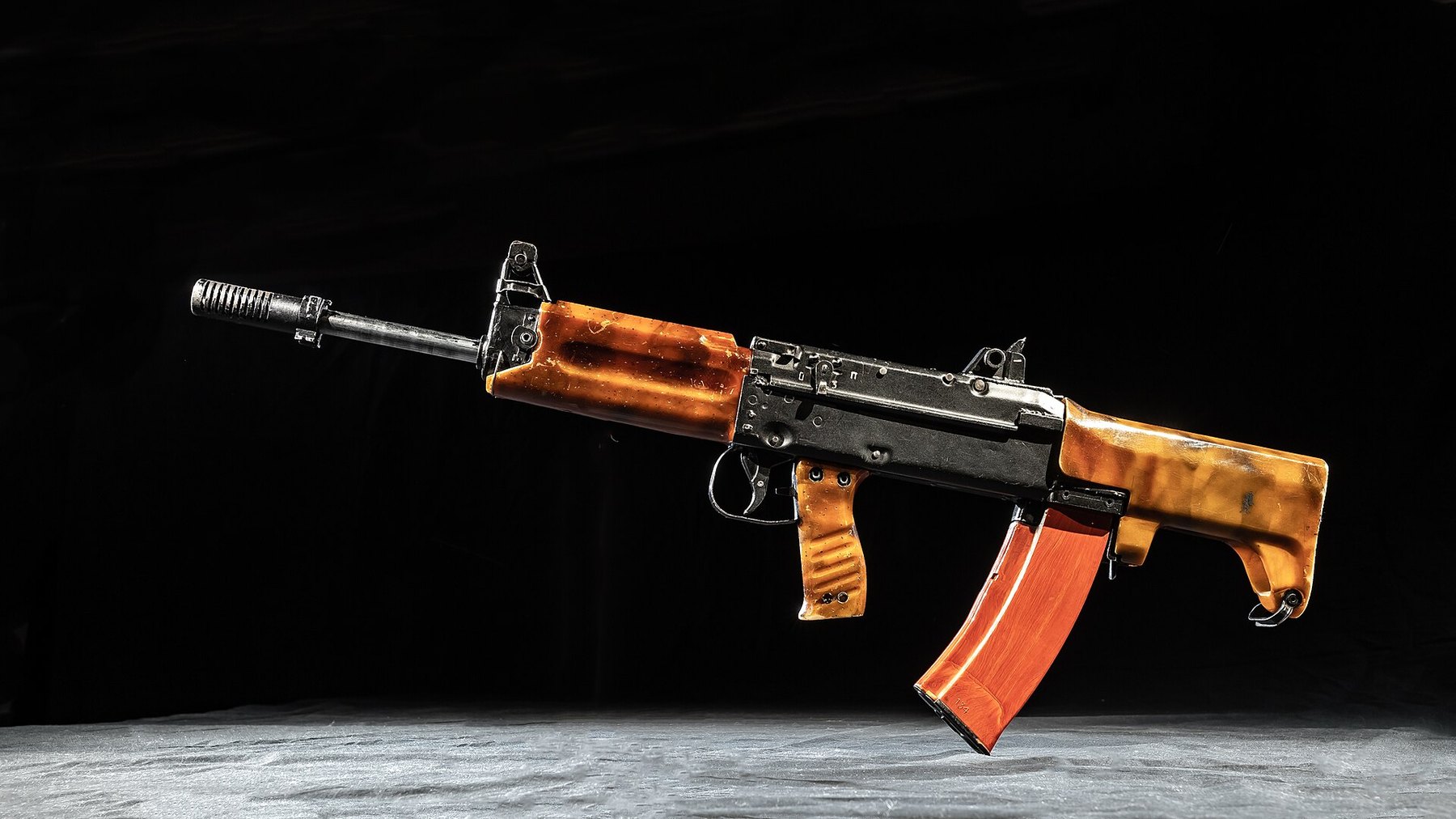 Figure 2 — Stechkin's TKB-0146, the bullpup carriage-scheme rifle Profil and RT name as an Abakan entrant, in a studio photograph. Photograph: Kalashnikov Media, uploaded to Wikimedia Commons by Avdajprl, Fil…
